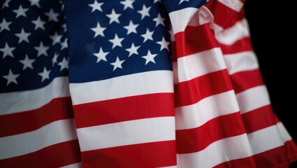 Fototapeta premium Close-up of the American flag with fabric folds United States