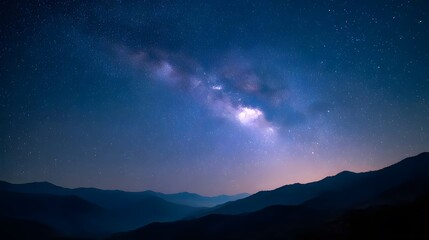 Fototapeta premium Starry night sky over mountain range.
