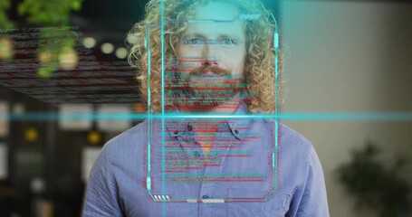 Mid-adult man standing in office viewing cyan scan activating code scrolling, collecting data text - Powered by Adobe