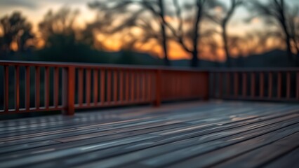 A serene wooden deck bathed in twilight glow, offering a peaceful and minimalist outdoor scene.