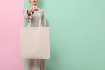 Woman holding an eco bag. Sustainable recycling bag image inspired by SDGs