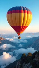 Obraz premium A breathtaking panoramic view from a hot air balloon soaring high above a vibrant blue landscape, fluffy white clouds below , freedom, blue, blue sky