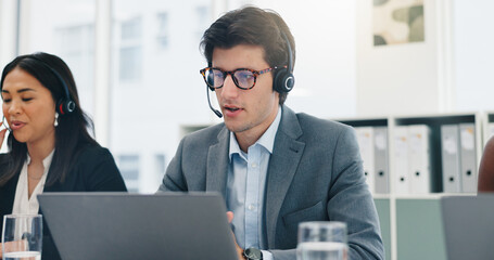 Microphone, team and man with laptop in call center for contact us, order processing or online help. Customer service, consultant or tech for inbound query assistance, account management or coworking
