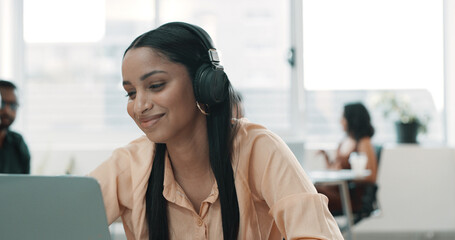 Laptop, headphones and smile with business woman in office for onboarding program, learning and research. Video conference, streaming and online workshop with person in agency for training course