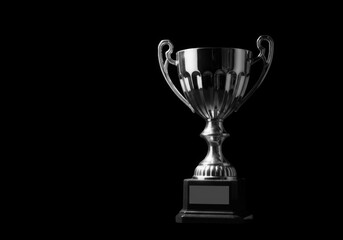 Silver trophy with black background symbolizing victory and achievement