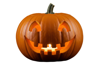 Isolated smiling jack o' lantern with candle burning inside for Halloween holiday