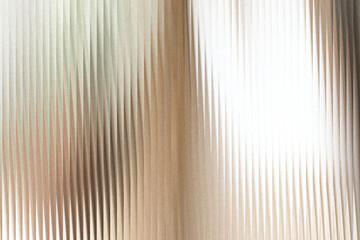Fototapeta premium A textured background with vertical ribbed lines, creating a sense of depth and abstract pattern with a soft, diffused light