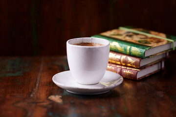 Cup of coffee on wooden background. Soft focus. Copy space