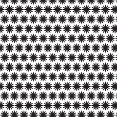 A seamless black and white starburst floral pattern with repeating geometric shapes, perfect for textile design, fabric prints, wallpaper, wrapping paper, digital backgrounds, and modern surface decor