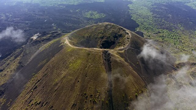 DRONE: ORBIT SHOT ZOOM IN SHOT OF THE PARICUTIN VOLCANO AND CLOUDS
