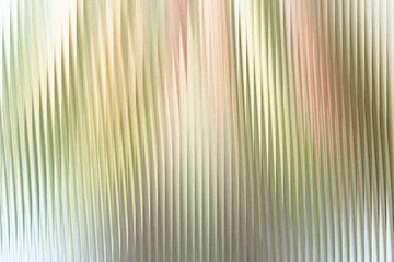Obraz premium A soft, abstract background with vertical lines of pastel colors, creating a gentle, textured effect