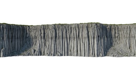 Tall, sheer grey cliff face with grass on top rock