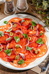 carpaccio with tomatoes and olives