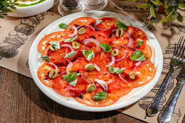 vegan carpaccio with tomatoes and olives