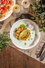 salmon tartare with avocado and cream sauce