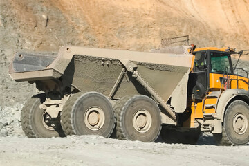 Dump trucks in gold ore quarry