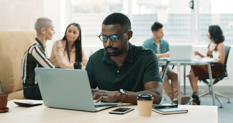 Creative, man and reading with laptop in office for email, writing article and editing draft. Journalist, coworking and pc for proofreading, report news and headline information on publication agenda