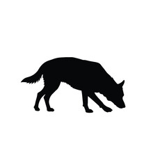 Black silhouette of a dog walking with head down on white background