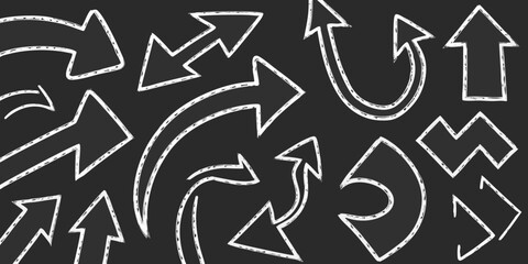 Collection of hand drawn arrows in various directions and styles on a dark background