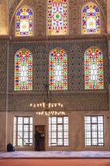 close up view of windows in mosque facing mecca