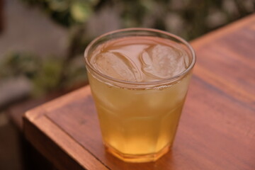 Ocha ice on wooden table. Ocha is a traditional green tea from Japan.
