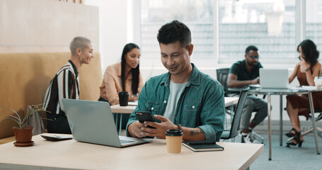 Fototapeta premium Businessman, laptop and smile with phone in office for notification, reading online report or email. Commission analyst, coworking and smartphone at desk for policy update, finance research and chat