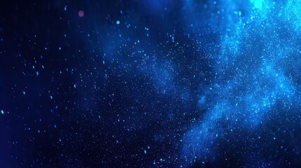 Obraz premium Abstract deep blue smoky swirls with tiny sparkling dots suggest cosmic depths or underwater magic