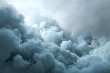 Billowing gray clouds fill the frame, textured and dynamic, with a patch of brighter sky visible above