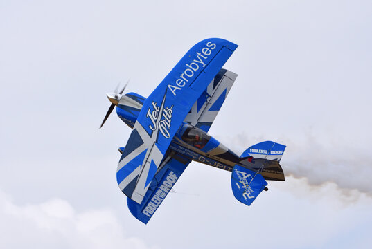 Pitts Special stunt plne in flight with smoke