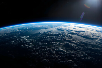 Fototapeta premium Dramatic High Angle View of Planet Earth in Space With Visible Blue Atmosphere And Clouds