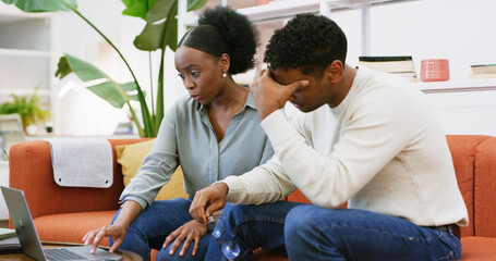 Budget, laptop and stress with couple on sofa in living room of home together for investment....
