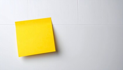 yellow sticky note on wall