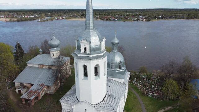 Aerial view of Staraya Ladoga, Russia riverside church with its white walls, silver dome