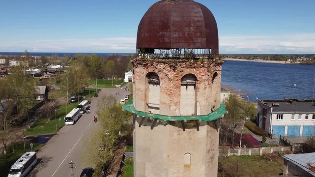 Aerial view of Staraya Ladoga, Russia riverside church with its white walls, silver dome