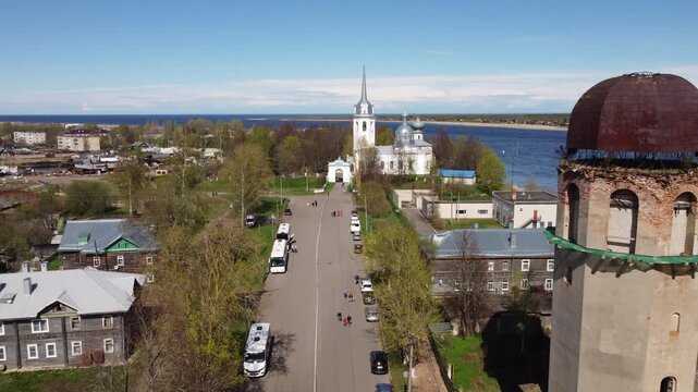 Aerial view of Staraya Ladoga, Russia riverside church with its white walls, silver dome