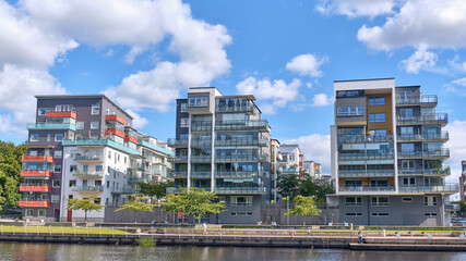 Modern riverside apartment architecture in Halmstad, Sweden showcasing urban development
