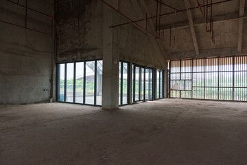 Internal space of unfinished concrete factory warehouse building