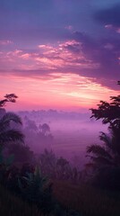 Fototapeta premium Misty sunrise over tropical landscape