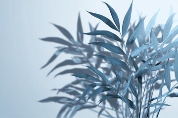 Obraz premium Silhouetted plant leaves create a stark, contrasting shadow against a pale blue background, casting a serene and minimalist ambiance