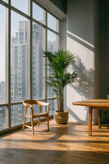 A modern office with floor-to-ceiling windows and simple wooden furniture A single plant sits in the corner
