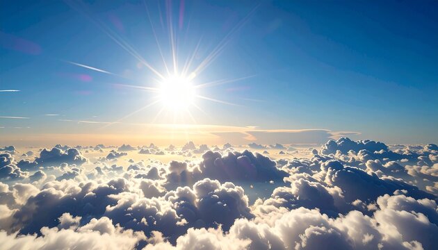 Bright blue sky filled with fluffy white clouds and radiant sun for a serene, uplifting atmosphere and natural beauty theme.