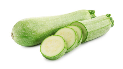 Fresh whole and cut zucchinis isolated on white