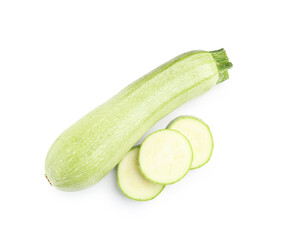 Fresh whole and cut zucchinis isolated on white, top view
