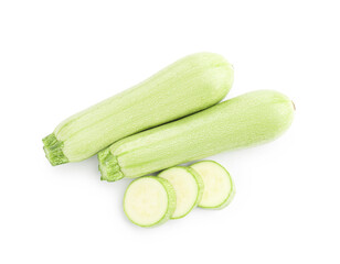 Fresh whole and cut zucchinis isolated on white, top view