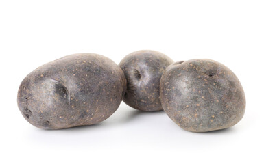 Fresh ripe purple potatoes isolated on white