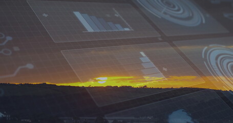 Hillside silhouette and buildings shimmering in rural landscape at dusk, with data overlays