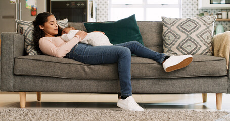 Sleeping, sofa and mother with baby in home for rest, afternoon nap and relax for bonding. Family, living room and mom with child with affection, love and care for relationship, support and comfort