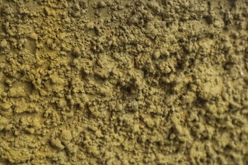 Background and texture of an uneven cement wall, close-up view