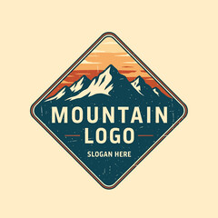 Obraz premium Diamond-shaped logo featuring a mountain range silhouette against an orange sky, with the words 