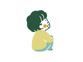 笑顔で座っている子ども